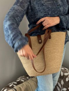 Beautiful and comfortable bag made of jute rope or cotton rope for choose. leather elements of black or marron colors.  This bag is original, comfortable and roomy. Can hold a whole list of things materials: Natural jute rope or cotton rope, leather.  Dimensions: Dimensions: bag height 26cm, top width 40-42cm. Completely handmade. Brown Braided Crochet Bag For Beach Season, Braided Tote Beach Bag For Everyday Use, Brown Braided Bags For Beach Season, Braided Tote Beach Bag, Braided Jute Tote Beach Bag, Summer Braided Bags For Everyday Use, Braided Jute Beach Tote Bag, Trendy Braided Jute Beach Bag, Brown Braided Crochet Bag For Beach