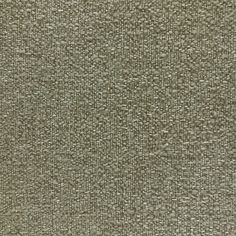 an upholstered fabric textured with small squares