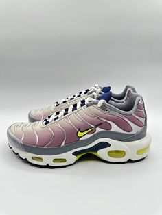 Elevate your sneaker game with these Nike Air Max Plus in Violet Dust/High Voltage. The high top shoe shaft style and synthetic upper material provide added support and style. The shoe width is medium and the US shoe size is 6. These sneakers are perfect for any athletic occasion with their high-quality design and comfortable fit. The product line is Wmns Nike Air Max Plus and the style code is FN8007 500. Don't miss out on this opportunity to add these stylish shoes to your collection. Nike High-top Sneakers With Abzorb Midsole, Mid-top Custom Sneakers With Air Cushioning For Streetwear, Custom Mid-top Sneakers With Air Cushioning For Streetwear, Custom Mid-top Sneakers For Streetwear With Air Cushioning, Nike Dynamic High-top Sneakers With Boost Technology, Nike Dynamic Round Toe Sneakers, Nike Dynamic High-top Sneakers, Nike Dynamic Style Sneakers With Round Toe, Sporty High-top Sneakers With Air Max Cushioning