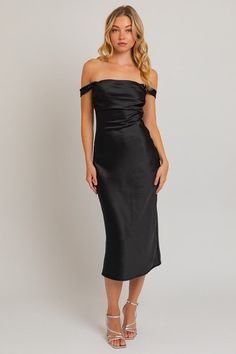 This new arrival is absolutely perfect for any kind of formal occasion! Our Elegant Evening Midi Dress is one you can dress up with any accessories! This black satin midi features a square neckline, ruched detailing, a side zipper closure, and can be worn on or off the shoulder! polyester spandex hand wash with cold water lay flat to dry iron if needed Model is wearing a size small Black Midi Dress Formal, Black Satin Midi Dress, Loungewear Summer, Evening Midi Dress, Satin Midi Dress, Crop Top Sweater, Dresses By Length, Crop Top Blouse, Black Midi Dress