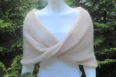 Ivory shawl, Winter wedding shawl, Bridal cape, Bridal wrap, Bridal shrug, Bridal shawl, Romantic wedding shawl, Wedding bolero, Mohair cape, Romantic wedding shawls and boleros, wedding shawl for bride and bridesmaids, White capes, Bridal wrap for winter wedding, Knit shawl, Knit wedding cape, Knit cape wrap sweater, Knitted shawl for wedding dress, Shawls and wraps This shawl is handcrafted and designed to be the perfect addition to any bridal dress and makes a wonderful gift. Perfect for laye Wedding Knit, Shawl For Wedding, Winter Wedding Shawl, Bridal Capes, Wedding Bolero, Bridal Shrug, Cape Wrap, Shawl Wedding, Wedding Shawls