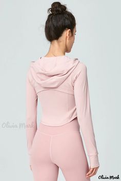 Olivia Mark - Blush Pink Athletic Hoodie with Thumbhole Sleeves and Zippered Round Hem Moisture-wicking Long Sleeve Winter Tops, Long Sleeve Moisture-wicking Tops For Winter, Winter Long Sleeve Moisture-wicking Tops, Grey Drawstring Hooded Top For Gym, Pink Crew Neck Activewear For Fall, Moisture-wicking Long Sleeve Tops For Fall, Solid Long Sleeve Activewear For Spring, Hooded Sweatshirt For Gym In Spring, Winter Sports Tops With Thumbholes