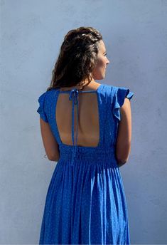 Blue Ruched Backless Maxi Dress, Fitted Beachwear Dress With Smocked Back, Flowy Summer Sundress With Smocked Back, Fitted Smocked Back Dress For Beachwear, Flowy Smocked Back Sundress For Summer, Vacation Backless Dress With Ruched Back, Bohemian Backless Maxi Dress With Smocked Back, Blue Backless Dress With Ruched Back, Blue V-neck Maxi Dress With Smocked Back