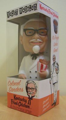 the kenick fried chicken doll is in its box