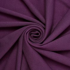 a close up shot of a purple fabric