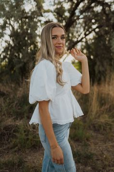 You can never have too many white blouses! Puff sleeve Peplum botton V neckline with a ruffle detail Very flattering fit Model is 5'5" and wearing a size small. Small: 2-4 Medium: 6-8 Large: 10-12 White Blouses, V Neckline, Puff Sleeve, Fitness Models, Blouses, How To Wear, White