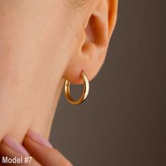 GOLDx's 17mm Tube Hoop Earring 14K Solid Gold Create a sophisticated feel in GOLDx's 14k solid gold Tube Hoop Earring, featuring a timeless hoop design in glowing gold vermeil. Works wonders in daily use. Add a couple more hoops to the mix for the full effect. ** Earrings are sold in pairs Material: 14K Solid Gold, real gold (not gold filled or no gold plated) Carat : 14 Karat Gold (585) Diameter: 1.7 cm Inner Diameter: 1.5 cm Width: 2.8 mm For other sizes, please contact us or check our store. Minimalist Yellow Gold Hoop Earrings With Shiny Finish, Yellow Gold Huggie Hoop Earrings With Shiny Finish, Gold Hypoallergenic Hoop Earrings For Formal Occasions, 14k Yellow Gold Hoop Earrings For Everyday Luxury, Classic Gold Tarnish Resistant Hoop Earrings, Formal Gold Hypoallergenic Hoop Earrings, Classic Gold Tarnish-resistant Hoop Earrings, Everyday Luxury Yellow Gold Huggie Hoop Earrings, Everyday Yellow Gold Shiny Hoop Earrings