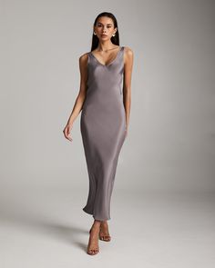 Bias cut silk crepe slip elegantly drapes on the body. Featuring an elongating V Neck at the front and back. 100% silk crepe Model is 5'10" and wearing a size S Product Care: Dry Clean Only Sleek Silk Dress With Satin Finish And V-neck, Silk V-neck Maxi Dress With Back Opening, Sleek Silk V-neck Dress For Formal Occasions, Pre-draped Silk Slip Dress For Gala, Pre-draped Silk Midi Dress With Bias Cut, V-neck Bias Cut Slip Dress For Gala, Bias Cut V-neck Slip Dress For Gala, Elegant V-neck Slip Dress With Back Opening, Fitted Silk Dress With Satin Finish And V-neck