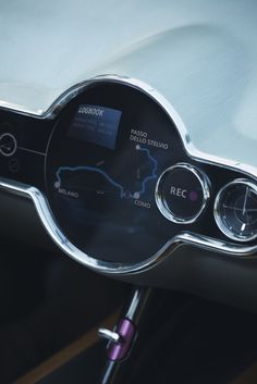 the interior of a car with gauges and dashboard