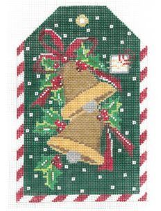 a cross stitch christmas ornament with bells