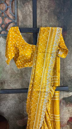 Mustard yellow modal silk saree with gotta work border, stitched blouse Traditional Dola Silk Blouse With Gota Work, Silk Blouse Piece With Gota Work For Navratri, Katan Silk Saree Set With Dori Work, Chanderi Saree Blouse With Gota Work, Chanderi Blouse Piece With Gota Work For Festivals, Festive Yellow Traditional Wear With Gota Work, Yellow Anarkali Blouse With Gota Work, Art Silk Blouse With Gota Work For Festivals, Mustard Yellow Saree Blouse Combination