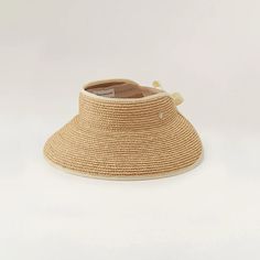 Mita | Natural Sand Wide Raffia Visor Hat | Helen Kaminski Helen Kahminski Hat, Adjustable Braided Straw Hat, Adjustable Natural Fiber Sun Hat For Spring, Spring Adjustable Natural Fiber Sun Hat, Adjustable Woven Sun Hat In Natural Fiber, Packable Straw Hat In Natural Color, Packable Natural Straw Hat, Adjustable Woven Straw Hat, Adjustable One Size Woven Straw Hat