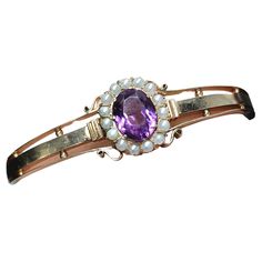 Antique imperial russian era bangle bracelet centered with natural amethyst stone in oval cut flanked with natural white pearls in 14k gold hall marked 56 imperial russian gold standard and assay mark and initial maker mark in cyrllic alphabet dates back to 1900/ 1910s Antique Amethyst Jewelry, Alphabet Dating, Amethyst Jewelry, Gold Bangle, Amethyst Stone, Gold Bangles, Oval Cut, Bangle Bracelet, Pearl White