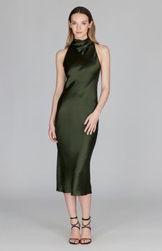 A classic bias cut dress with an elegantly draped high cowl neck. This sleeveless dress is cut in a flattering tea length with a clean baby hem finish. This dress is unlined and needs only a back neckline keyhole closure thanks to the nature of bias cut fabric. Green Cocktail Dress, Cowl Dress, Bias Cut Dress, Tea Length, Dress 16, High Neckline, Electric Blue, Steel Blue, Cowl Neck