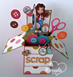 a card with scissors and buttons in it