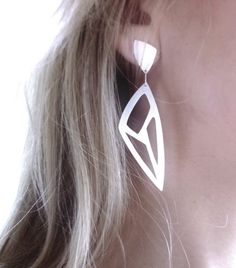 Sterling Silver Long Triangle Geometric Cut-Out by tothemetal Modern Teardrop Plug Earrings As Gift, Modern Teardrop Plug Earrings For Gift, Modern White Pierced Earrings, Silver Triangle Single Earring, Modern Pierced Wrap Earrings As Gift, White Sterling Silver Pierced Plug Earrings, White Sterling Silver Plug Earrings, Modern White Teardrop Hoop Earrings, White Triangle Earrings For Gift