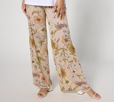 In a playful mood? Pop on these smooth and drapey Liquid Knit® pants that punch up any outfit with their fun floral print and easy wide-leg silhouette. From Susan Graver. High-waisted Floral Wide Leg Pants For Spring, Spring Floral Print High-waisted Wide Leg Pants, Spring Floral Print Wide Leg Pants, Spring Floral Print Wide Leg Bottoms, Floral Print High-waisted Wide Leg Pants For Day Out, Printed Ankle-length Wide Leg Pants For Spring, Spring Day Out Printed Wide Leg Pants, Casual Floral Print Wide Leg Pants For Spring, Printed Wide Leg Pants For Spring Day Out