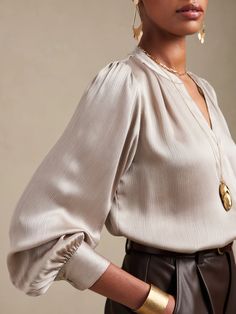 Satin Shirred-Neck Blouse | Banana Republic Factory Elegant V-neck Top With Cuffed Sleeves, Elegant Blouse With Band Neckline For Work, Chic Tops With Bishop Sleeves And Buttons, Elegant V-neck Blouse With Buttons, Elegant Band Neckline Tops For Workwear, Chic Band Neckline Tops For Work, Chic Tops With Band Neckline For Workwear, Elegant V-neck Top With Button Cuffs, Chic Workwear Tops With Band Neckline