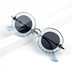 Unisex Casual Light Blue Tinted Sunglasses, Casual Light Blue Sunglasses With Mirrored Lenses, Blue Casual Sunglasses For Summer, Trendy Light Blue Tinted Sunglasses, Blue Plastic Sunglasses For Summer, Light Blue Polarized Sunglasses For Summer, Casual Light Blue Sunglasses With Uv Protection, Trendy Light Blue Sunglasses With Gradient Lenses, Light Blue Tinted Sunglasses For Summer