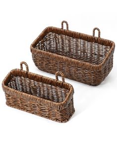 two brown wicker baskets sitting next to each other