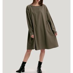 Gentle Herd Roundneck Wool-Blend Dress. Nwt. Size Medium Color Is Army Green Mid-Length Long Sleeves Relaxed Silhouette With A Flared Hem Wool/ Polyester/ Viscose/ Spandex Length: 37.25” Armpit To Armpit: 22” Will Ship The Same/ Next Day M-F. If You Have Any Questions Please Feel Free To Ask. Casual Workwear Dress With Curved Hem, Olive Long Sleeve Midi Dress, Oversized Green Dress For Fall, Fall Daywear Shift Midi Dress, Green Oversized Dress For Workwear, Oversized Long Sleeve Midi Dress, Green Oversized Dress For Work, Oversized Green Dress For Work, Chic Oversized Solid Color Midi Dress