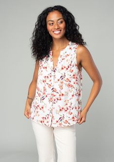 A classic sleeveless spring blouse in a natural and rose pink floral print. Floral print Relaxed fit Sleeveless Hip length Split neckline Banded collar Self-covered button front Classic spring blouse Polished enough for the office but laid-back enough for the weekend, our classic spring blouse is designed in an ultra-pretty floral print. With a split v-neckline and a delicate self-covered button front. Model is 5'8, wearing a size S.Style: I-15020W-SDT-FV Chic Floral Print Top With Split Neck, Feminine Split Neck Blouse, Summer Floral Print Blouse With Split Neck, Summer Floral Print Split Neck Blouse, Feminine Floral Print Top With Split Neck, Summer Split Neck Blouse With Floral Print, Pink Floral Print Blouse With Split Neck, Pink Floral Print Split Neck Blouse, Feminine Summer Blouse With Split Neck