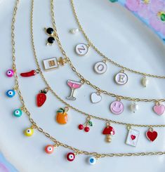 Cute Charm Necklaces With Adjustable Chain, Customizable White Novelty Jewelry, Multicolor Pendant Charm Necklace As Gift, Cute Adjustable Charm Necklaces, Cute Adjustable Charms Necklaces, Cute Necklaces With Charms, Playful Handmade Gold Jewelry, Customizable Novelty White Jewelry, Gift Necklaces With Removable Round Charms