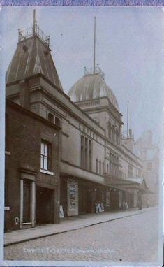 an old black and white photo of a building