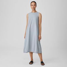 The lantern dress: a modern silhouette with a subtly curved shape. Light and breezy in organic cotton that's washed for a relaxed feel. Relaxed Fit Knee-length Washed Dress, Knee-length Linen Beach Sundress, Casual Knee-length Linen Dress With Relaxed Fit, Relaxed Fit A-line Linen Midi Dress, Eileen Fisher Crinkled Silk Dress, Lantern Dress, Eileen Fisher, Dress Clothes For Women, Round Neck