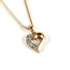 "Vintage Gold over Sterling Silver Open Heart with One Diamond Pendant Necklace. The nice sterling box chain measures about 18\" long and is marked R (Ross Simons) Italy, 925. The little dainty heart pendant measures about 5/8\" tall including the bail x 1/2\" wide. It is marked R925, China and weighs about 3.2 grams. Its in good used condition. Add this pretty heart to your collection today! Visit our FAQ section: https://www.etsy.com/shop/KayZees?ref=hdr_shop_menu#more-section If you have any questions please don't hesitate to ask!" Box Chain Necklace For Mother's Day Anniversary, Mother's Day Anniversary Box Chain Necklace, Anniversary Heart Pendant Necklace With Box Chain, Valentine's Day Anniversary Box Chain Necklace, Valentine's Day Gift Heart Necklace With Box Chain, Valentine's Day Heart Necklace With Box Chain, Gold-tone Heart-shaped Necklace With Gold Chain, Gold Heart Pendant Vintage Charm, Valentine's Day Necklace With Box Chain And Heart Pendant