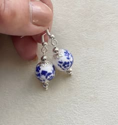 Blue Porcelain Earrings,Porcelain China earrings, Blue Silver  Earrings, Ceramic Bead Earrings, Blue White Flower Earrings, Mothers Day Gift, Gifts For Her, Birthday Gift Oriental themed porcelain floral earrings in the colours of blue flowers on white background. To capture each of the round beads, I have decorated the beads with silver plated scallop filigree to gifts it a bright fresh contrasting look. Packaging: Earrings comes wrapped in tissue paper, a lovely organza pouch with a personal B Ceramic Beads Jewelry, Porcelain Beads Jewelry, Blue And White Jewelry, Blue And White Earrings, China Earrings, White Flower Earrings, Ceramic Bead Jewelry, Earrings Ceramic, White Flower Earring