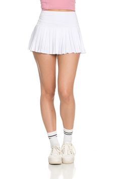 Next Restock Now Available for Pre-Order. NEW 2.0 ﻿Off-White Pleated Tennis Skirt is back and BETTER than ever. Now offering more sizes and sizing accuracy. Just like the original, it is best everyday piece to add to your wardrobe because of its versatility & functionality. The skirt features built-in spandex shorts that include a comfortable fit and side pockets for storage. This exclusively designed Gold Hinge skirt is made of quick dry material and can take on any activity such as golf, tenni Summer White Elastane Mini Skirt, White 4-way Stretch Skirt With Built-in Shorts, White Sporty Skirt, White Elastane Mini Skirt, Summer Pleated Elastane Tennis Skirt, White Stretch Elastane Mini Skirt, Summer Pleated Elastane Skirt, Stretch White Swim Skirt, Sporty Short Pleated Skirt For Summer