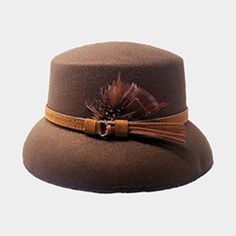 Etails Crown Circumference: 23" Crown Height : 3.5" Brim Height : 2.8" Material : 65% Cotton, 35% Polyester Chic Brown Winter Hats, Chic Brown Felt Hat For Winter, Elegant Brown Felt Hat For Summer, Chic Brown Cloche Hat For Spring, Chic Fitted Brown Felt Hat, Chic Brown Fitted Felt Hat, Brown Cloche Hat For Fall, Brown Flat Brim Cloche Hat For Winter, Brown Wide Brim Cloche Hat For Spring