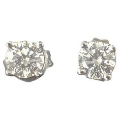 14 Karat White Gold Round Brilliant Diamond Stud Earrings- These sparkling stud earrings each feature one round brilliant cut diamond set in classic 14K white gold. Push back closures. Approximate total diamond weight: .50 ct. Diamond color: J-K Diamond clarity: SI1 Size: 4 mm Weight: 0.5 dwt./ 0.8 gr. Stamped: 14K Very good condition, professionally polished. Will come packaged in a gift box or pouch (when possible) and will be shipped U.S. Priority Mail Insured. DV06032417KCS Diamond Stud Earrings, Diamond Set, Diamond Stud, Brilliant Diamond, Round Brilliant Cut Diamond, Diamond Clarity, Diamond Earrings Studs, Brilliant Cut Diamond, Diamond Studs