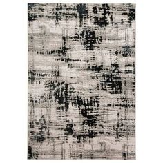 an abstract rug with black and white paint strokes on it's edges, in grey tones