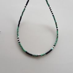 Elevate your summer bohemian style with this unique Mens Beaded Necklace! This Boho-inspired piece is perfect for adding a touch of flair to any outfit. Handcrafted with high-quality beads, this versatile Mens Necklace can also be styled as a beaded choker for a trendy look. Whether you're shopping for yourself or looking for beaded necklaces for women gifts, this necklace is sure to make a statement. Upgrade your accessory game with this one-of-a-kind beaded necklace today! Miyuki round 8/0 Pic Bohemian Beaded Bracelets With Black Beads For Beach, Bohemian Black Beaded Bracelets For Beach, Bohemian Black Beads Jewelry, Bohemian Necklace With Spacer Beads For Beach, Bohemian Beach Necklace With Spacer Beads, Bohemian Black Beaded Necklaces For Summer, Bohemian Summer Necklace With Black Beads, Bohemian Black Beads Necklace For Summer, Bohemian Adjustable Silver Beads