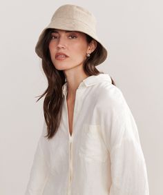 Linen Bucket Hat Natural Inspired by fisherman styles, our elevated take on the classic bucket hat is the summer’s definitive beach bag essential. 100% linen. Made in Portugal. | Jenni Kayne Women's Linen Bucket Hat Size Small/Medium Natural Linen Sun Hat For The Beach, Natural Linen Sun Hat For Vacation, Natural Linen Sun Hat For Beach, Chic Natural Sun Hat For Everyday Use, Chic Natural Sun Hat For Everyday, Chic Natural Color Sun Hat For Everyday Use, Chic Natural Color Sun Hat For Everyday, Casual Beige Linen Hat, Summer Panama Hat With Curved Brim For Everyday