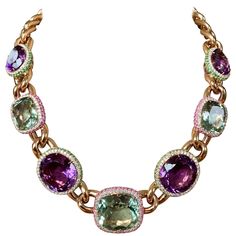 For Sale on 1stDibs - Statement necklace in 18 Karat rose gold, set with 4 Amethysts weighing 68,26 ct. All 4 Amethysts are surrounded by Diamonds and Tsavorites. 3 Prasiolites Traditional Luxury Multicolor Jewelry, Luxury Multicolor Women's Necklace, Traditional Multicolor Luxury Necklaces, Luxury Multicolor Jewelry With Halo Setting, Champagne Diamond Necklace, Runway Necklace, Bold Statement Necklaces, Horseshoe Pendant, Stone Statement Necklace