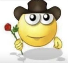 a smiley face with a hat holding a rose