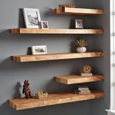 10 FAQs About Floating Shelves Q: "What makes floating wooden shelves a great addition to home decor?" A: Floating wooden shelves provide a versatile and stylish solution for home decor by offering functional storage without sacrificing aesthetics. They can showcase decor items, books, and collectibles, enhancing the overall look of any room.  Q: "How can white floating shelves contribute to a clean and stylish interior?" A: White floating shelves contribute to a clean and stylish interior by adding a sense of lightness and simplicity. They create a neutral backdrop for displaying colorful items, making the space visually appealing.  Q: "In what ways can floating bookshelves be utilized for both storage and display purposes?" A: Floating bookshelves are excellent for storage and display. T Reclaimed Wood Floating Shelves Bedroom, Floating Shelves For Corner Wall, Thick Wood Shelves Living Room, Floating Wood Shelves Office, Floating Shelves For Toys, Wall Book Display Ideas, Modern Bedroom Shelving, Wall Shelves Living Room Decor, Wood Wall Shelf Ideas