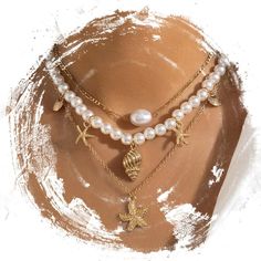 PRICES MAY VARY. Gold layered necklace is made of pearls and high quality alloy with gold plated.low irritation, safe and comfortable to wear for long time, not easy to rust. Beach necklace has three separate necklaces.Starfish necklace’s size: As shown in the picture, there is only one size,but there are extension chains that can be adjusted suit for most women. Pearl necklaces can match different styles such as skirt,dress,Bikini，t-shirt or other outfits depending on your preference, necklace Sea Shells Necklace, Beach Accessories Jewelry, Gold Layered Jewelry, Pearl Necklace Layered, Necklaces Beach, Gold And Pearls, Conch Pearl, Beach Necklace, Necklace Layered