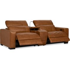 the reclining sofa is made from leather and has two seats on each side, one with