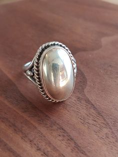 "This was designed by Georg Jensen himself, a fantastic older ring in great shape. Some scuffing from age, but overall great. Please see pictures for details.  Basic info: Size- Approx. 7\" US Color: Silver Type- Silver work weight- approx. 6.8g Silver Mark- 925S Denmark Maker Mark - iconic Georg Jensen circle Shape- Wonderful modernist statement ring SHIPPING: All orders are guaranteed to ship the same or following day. If your purchase occurs on a Sunday you may request UPS shipment as the pos Sterling Silver Domed Jewelry Gift, Domed Sterling Silver Jewelry Gift, Domed Sterling Silver Jewelry For Gifts, Classic Sterling Silver Dome Ring In Silver, Victorian Hallmarked Silver Signet Ring, Antique White Gold Signet Ring, Elegant Concave Dome Ring In Sterling Silver, Classic Oval Cabochon Dome Ring With Polished Finish, Gold Oval Dome Ring In Sterling Silver