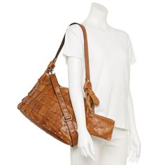 Carry your essentials in style with this AmeriLeather Miao leather shoulder bag. DETAILS 15.5"L x 10"H x 4.75"W Handle: 11'' drop Zipper closure Silver-tone hardware Interior: 1 zip pocket, 2 slip pockets Exterior: coin purse Water repellentCONSTRUCTION & CARE Exterior: leather Lining: polyester Wipe clean Imported Size: One Size. Color: Black. Gender: female. Age Group: adult. Bag Details, Shoulder Bag Black, Water Repellent, Leather Shoulder Bag, Cleaning Wipes, Gender Female, Zip Pockets, Coin Purse, Silver Tone