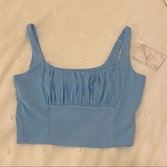 Never Worn! A Great Staple With Double Lined Support In The Chest Blue Ruched Tank Top For Spring, Spring Blue Ruched Tank Top, Casual Blue Ruched Top, Blue Ruched Sleeveless Top, Blue Ruched Tops For Spring, Casual Light Blue Ruched Top, Fashion Tops, Color Blue, Women's Fashion