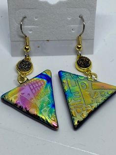 These are beautiful summer earrings that will turn heads.  They are made of dichroic glass. Adjustable Iridescent Drop Earrings, Polymer Jewellery, Clay Arts, Summer Earrings, Polymer Jewelry, Summer Earring, Paper Jewelry, Triangle Earrings, Dichroic Glass