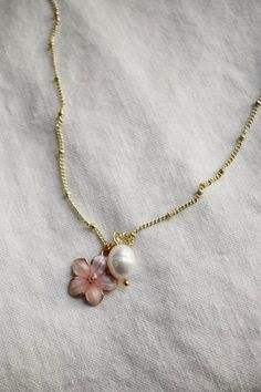 This dainty Charm Necklace is perfect for a girly girl on vacay! Available in 3 color variations. Bestie Gifts Ideas, Cute Dainty Necklaces, Dainty Charm Necklaces With Delicate Chain For Summer, Dainty Charm Necklace With Delicate Chain For Summer, Chic Summer Jewelry With Flower Charm, Handmade Flower-shaped Chic Jewelry, Rose Gold Flower Jewelry For Summer, Summer Rose Gold Flower Jewelry, Pink Flower Charm Necklace With Flower Pendant