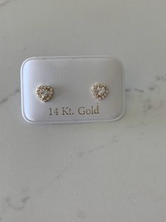 14K Heart Cubic ZC Earrings, Dainty Earrings, Women Earrings, Kid Earrings, Gold Hearts, Gold Heart Earrings Beautiful, elegant and classic heart cut studs ♦ Materials: 14K Gold, Cubic Zirconia ♦ Available colors: 14K Yellow Gold♦ Closure: Push Backs♦ Earrings Measurements: 6MM Width by 6MM Height PLEASE REFER TO THE ACTUAL DIMENSIONS. WE HAVE ENLARGED THE PICTURES FOR A BETTER VIEW-------------------------------------------------- ♦ --------------------------------------------------MATERIALS14K Diamond Heart Charm Earrings With Heart Cut, Heart Cut Diamond Earrings With Accents In 14k Gold, 14k White Gold Heart Cut Earrings, Elegant 14k Gold Heart Earrings, Formal 14k Gold Heart Earrings, Gold Diamond Heart Earrings For Gift, Elegant Heart Pendant Earrings In Cubic Zirconia, Gold Heart Shaped Diamond Earrings In Sterling Silver, Gold Heart Cut Diamond Earrings