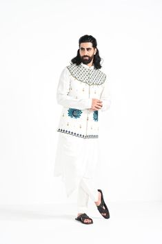 A dewy mist coloured Rajasthani inspired peacock motif hand embroidered nehru jacket with a cowl draped kurta made of bamberg raw silk. Paired with white slim fit Pant Pajama. Color of the actual garment may vary due to lighting conditions during the shoot.

Size Chart For Men





	
	
					Men's Size Chart
		

		
		
						
				Size Chart For Men
				Custom Size Measurement Guide
			
			
				
				
				Custom Size Measurement Guide
1. Take your measurements at ease…don’t hold your breath!
2. Be a Traditional Nehru Jacket In Cotton Silk With Cutdana, Traditional Cotton Silk Nehru Jacket With Cutdana, Traditional Nehru Jacket With Cutdana In Cotton Silk, Traditional Chanderi Nehru Jacket For Transitional Seasons, Traditional Cotton Silk Nehru Jacket For Designer Wear, Diwali Traditional Cotton Nehru Jacket, Designer Cotton Nehru Jacket With Dabka, Traditional Cotton Silk Nehru Jacket For Festivals, Traditional Cotton Silk Nehru Jacket For Eid