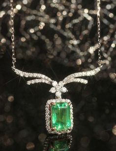 •Condition: Brand new•Center Stone: Natura emerald from Zambia, Emerald Cut, 0.9ct, 7x5mm•Side Stone: Natural white diamond, round cut, 0.31ct total (VS1 clarity and F color) •18k Solid White GoldEach piece is made-to-order with care and special attention to detail. all items are made with conflict-free diamonds and gems.The item will be gift wrapped and shipped.---------------------------------------------------------Available in :14k Rose or Yellow Gold, White Gold18k Rose or Yellow Gold, Whit Dazzling Formal Emerald Gemstone Necklace, Formal Emerald Necklaces With Diamond Cut, White Gold Diamond Emerald Necklace With Hallmark, Exquisite Brilliant Cut Emerald Necklace, Dazzling Emerald Necklace For Formal Occasions, Elegant Emerald Cut Emerald Necklace For Formal Occasions, Luxury Emerald Cut Emerald Necklace For Anniversary, Classic Emerald And Diamond Necklace, Formal Brilliant Cut Emerald Pendant Necklace